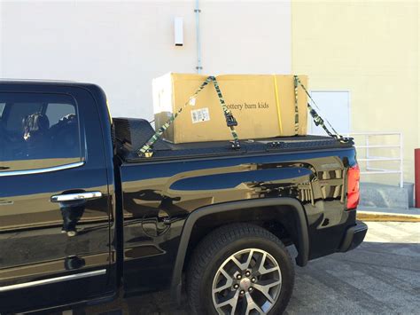 Black Heavy-Duty Truck Bed Cover on Black GMC Sierra | Flickr