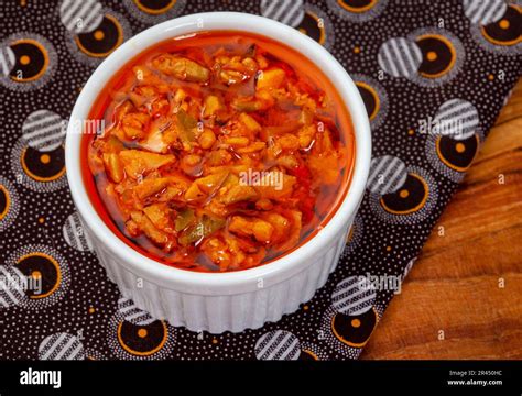 Traditional South African Mango Atchar or Achar on African printed cloth with scoop Stock Photo ...