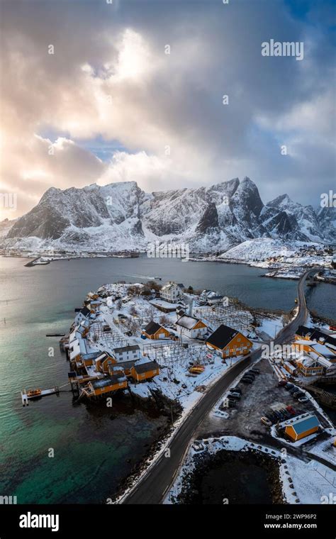 Aerial view of the Sakrisøya island and Reine Bay towards Reinebringen in winter, Lofoten ...