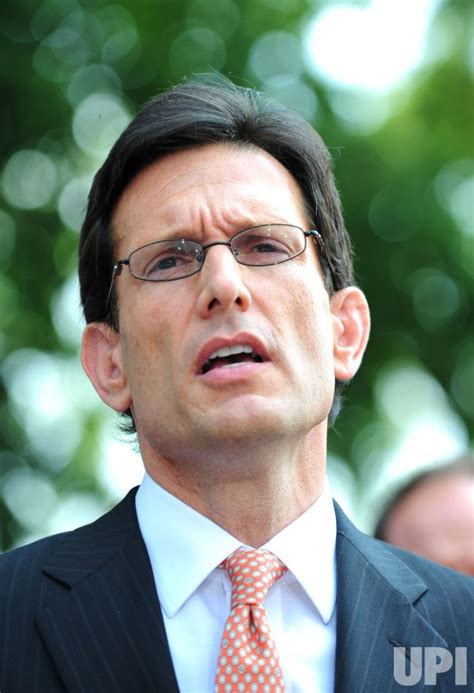 Photo: House Majority Leader Eric Cantor speaks to the media following ...