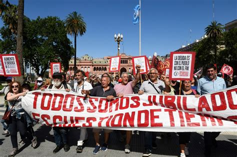 Argentina’s president announces economy deregulation as thousands ...