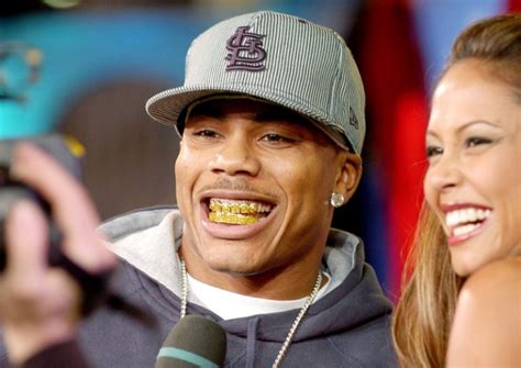 19 Rappers Who Wear Gold Teeth Grills - Body Art Guru