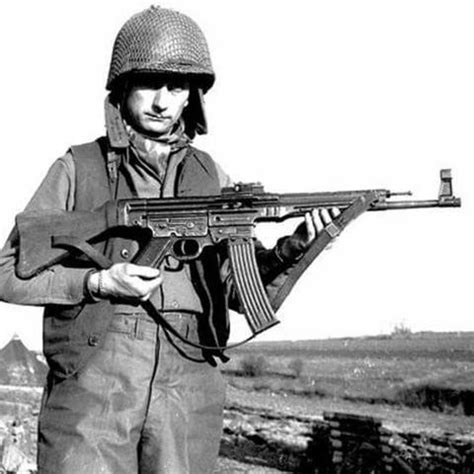 American soldier holding a captured STG44, the precursor to the more ...