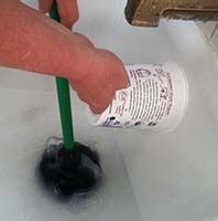 Unclogging Bathtub Shower Drain with Plunger and Plastic Container ...