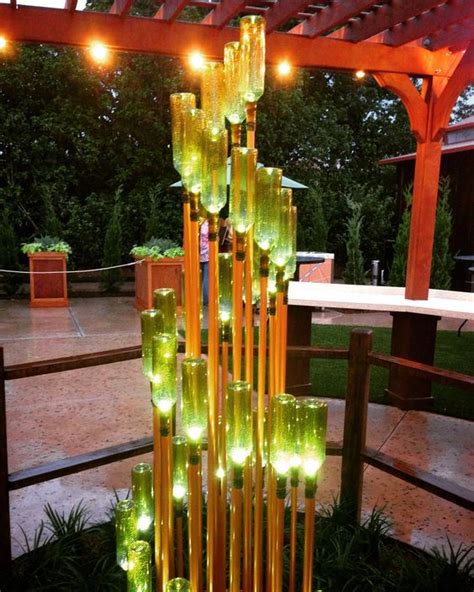 15 DIY Yard Projects to Make With Wine Bottles - Top Dreamer