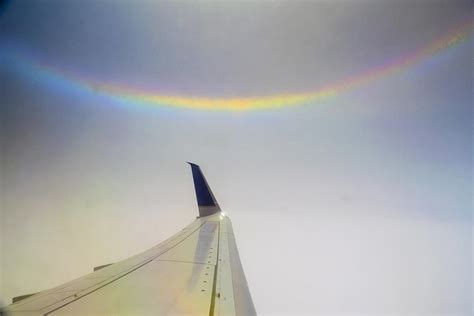 Circumzenithal Arc Off of Wing Tip Photograph by Frank Wilson - Fine Art America