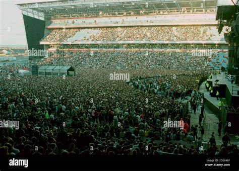 Oasis fans fill the ground at Maine Road in Manchester in anticipation ...