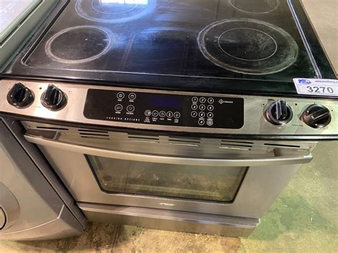 WHIRLPOOL INDUCTION STOVE WITH CONVENTIONAL OVEN - Able Auctions