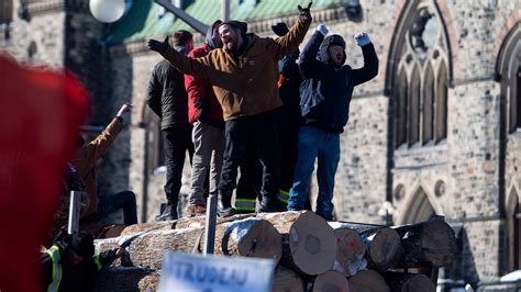 Truckers in Canada protest COVID mandate as some demonstrators dance on war memorials | World ...