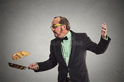 Smiling Man Tossing Pancakes On Frying Pan Stock Photo - Image of funny ...