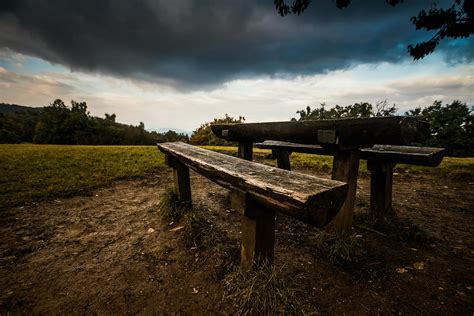 Picnic Table on Grass Field during Daytime · Free Stock Photo