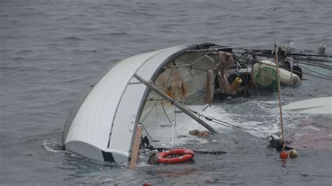 Couple bound for New York City rescued from capsized boat off New Jersey coast - ABC7 New York