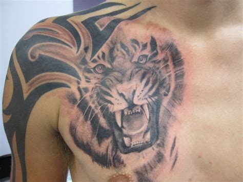 Tribal tiger chest tattoo by jamierees - Tattooimages.biz