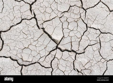 Cracked dry clay loam soil. Drought Stock Photo - Alamy