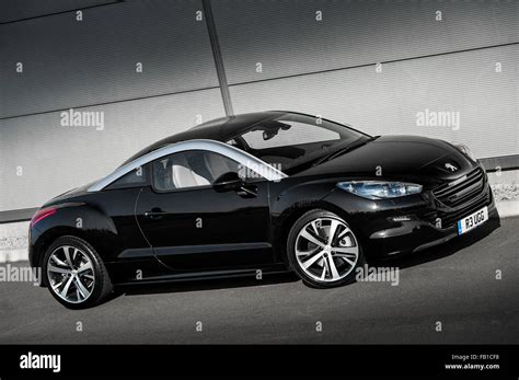 Black Peugeot RCZ Coupe sports car Stock Photo - Alamy