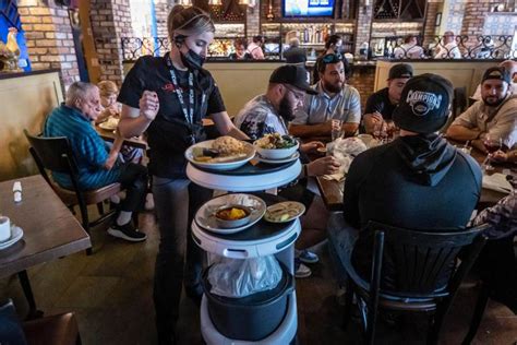 This Restaurant In Florida Hired Robot Waiters - And Their T