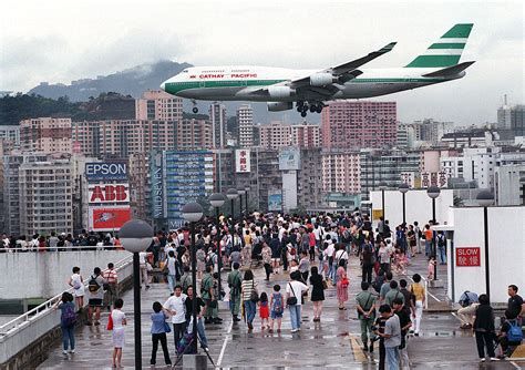 See the Crazy Landings at Kai Tak, the Legendary Airport That Closed 20 Years Ago - The Points Guy