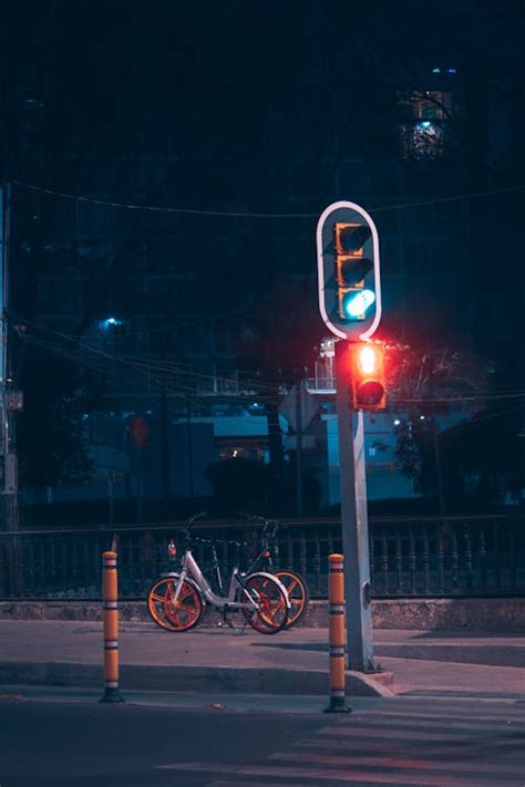 Traffic Lights on Road at Night · Free Stock Photo