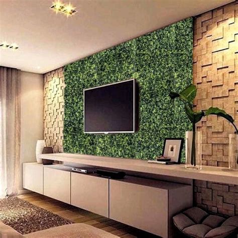 a living room with a flat screen tv mounted to the side of it's wall