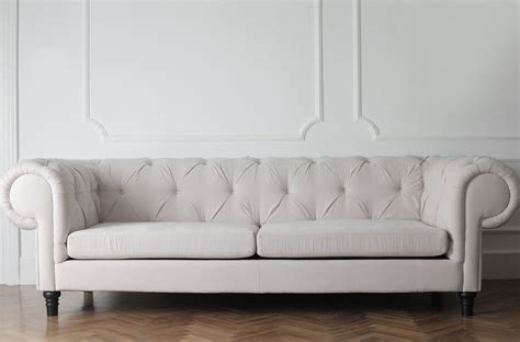 Photo Of White Couch On Wooden Floor · Free Stock Photo