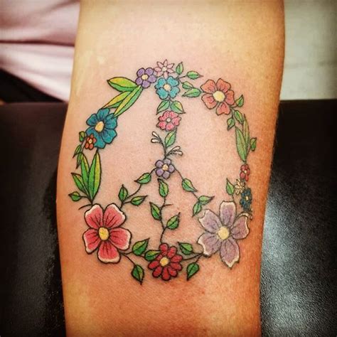 [New] The 10 Best Tattoo Ideas Today (with Pictures) - Peace sign flower tattoo on forearm by ...