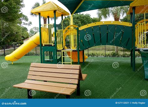 Slides on a playground stock image. Image of astoturf - 67112021