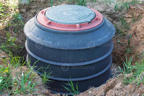 Installation of underground tank for sewage system 15743075 Stock Photo at Vecteezy