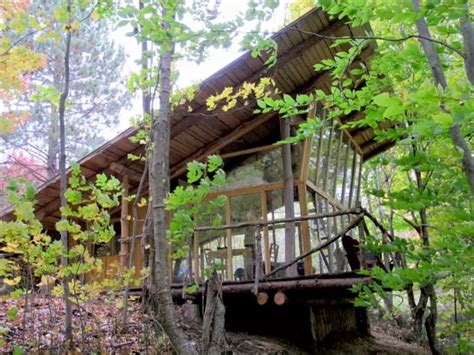 Enjoy this woodland cabin's fantastic views, then turn toward its gorgeous interior design