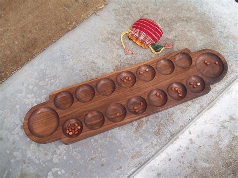 Brian's Mancala Board - The Wood Whisperer