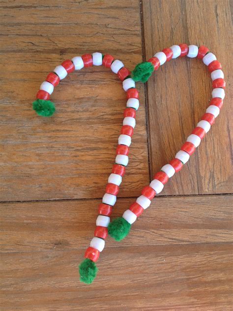 Easy Candy Cane craft - green chenille stem with alternating red and white beads | Chenille stem ...