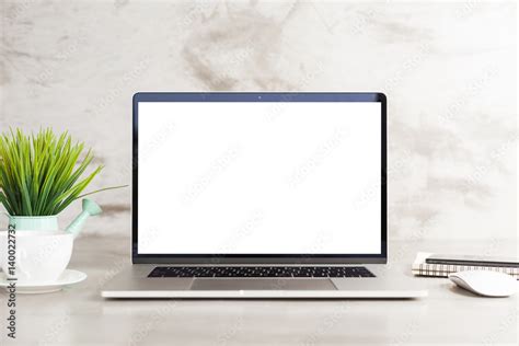 laptop computer white blank screen on work table front view Stock-foto | Adobe Stock