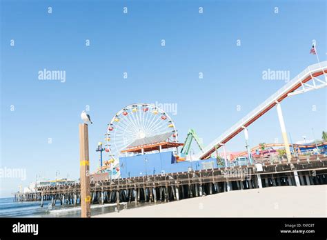 Santa Monica Pier rides and attractions with waterslide Stock Photo - Alamy