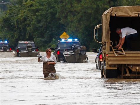 Thousands Rescued from Submerged Homes and Cars in Flooded Louisiana ...