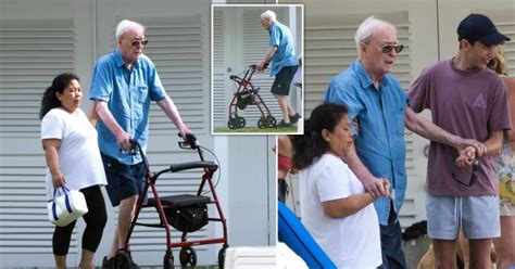 Sir Michael Caine uses walking frame as he soaks up sun in Barbados ...