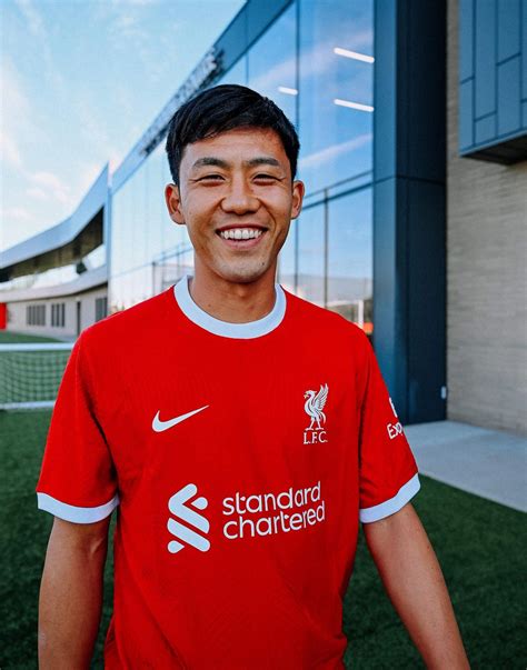 In photos: Wataru Endo's Liverpool signing day at the AXA Training Centre - Liverpool FC