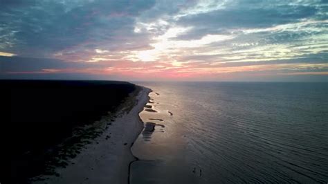 Aerial View Over the Kolka Cape, Baltic Sea, Latvia. During Autumn Evening Sunset, Stock Footage