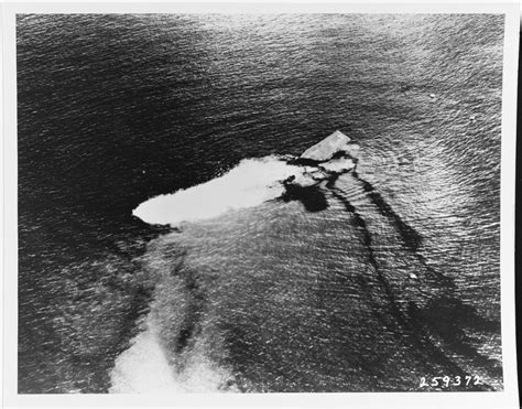 USS Saratoga (CV-3) sinking in Bikini Lagoon after she was fatally damaged by the Baker Day ...