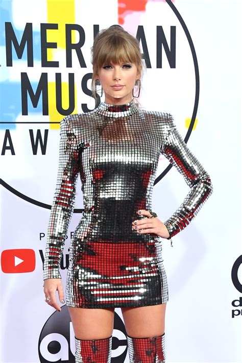 Grab Your Sunglasses! Taylor Swift Transforms Into a Life-Size Disco Ball For Her AMAs Comeback ...