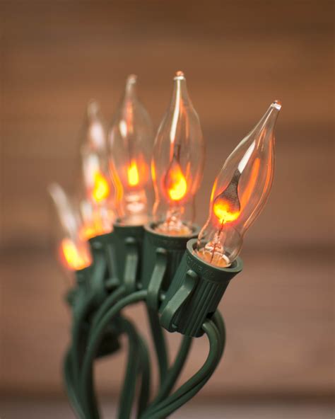 Our flickering flame string lights dance into the holiday season with ...