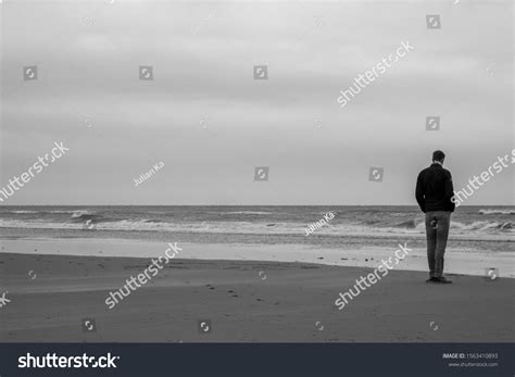 16,393 Lonely man on beach Stock Photos, Images & Photography ...