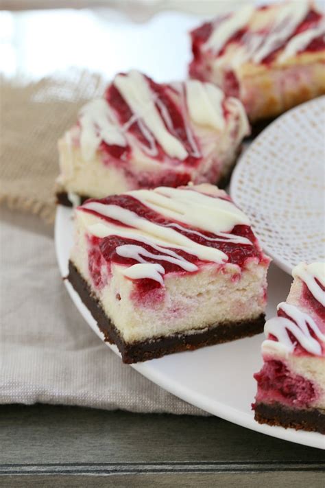 The BEST White Chocolate & Raspberry Cheesecake Slice - Bake Play Smile