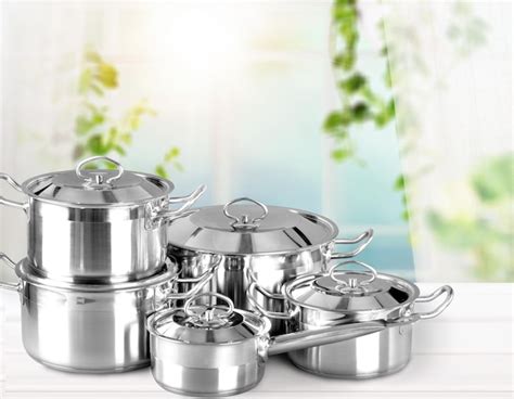 Premium Photo | Stainless steel pots and pans