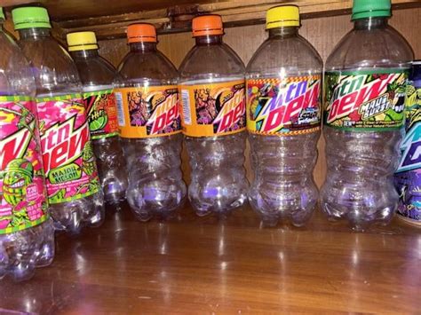 My bottle and can collection (mostly dew) : r/mountaindew