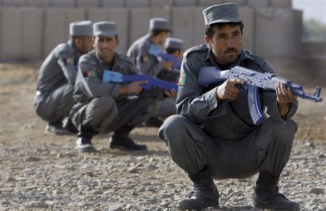 T.D.N.N.: Two NATO servicemen shot dead by men wearing Afghan police uniforms