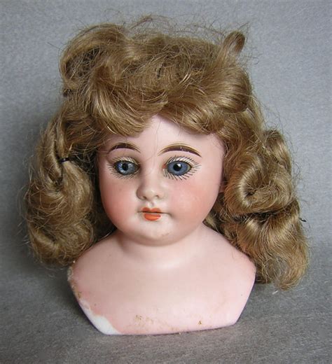 Antique Porcelain Doll Head with Blue Glass Eyes -- Antique Price Guide Details Page