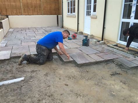 Laying Marshalls Natural Stone paving slabs | Paving stones, Brick ...