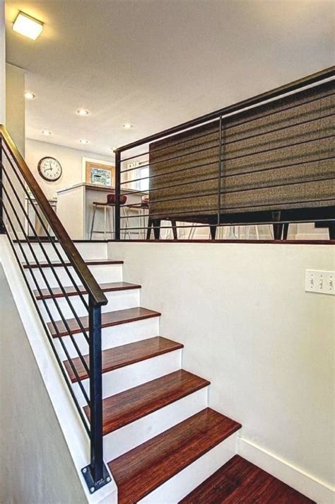 split level living room railing looking for staircase design inspiration check out our photo ...