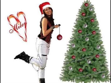 miley cyrus - rockin around the christmas tree + lyrics - YouTube