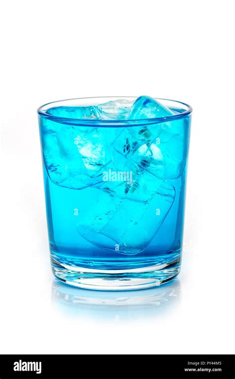 blue drink with ice cubes on white background, isolated Stock Photo - Alamy