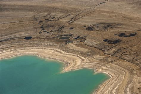 Sinkholes In Northern Dead Sea Area Photograph by Ofir Ben Tov - Fine Art America